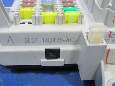 smart junction box 6e5t14b476al|Used 2006.